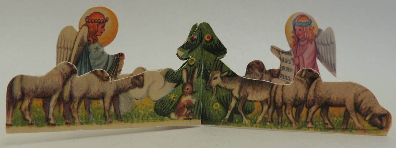Seitenaufsteller der Krippe mit Engelchen, Weihnachtsbaum und Kaninchen.